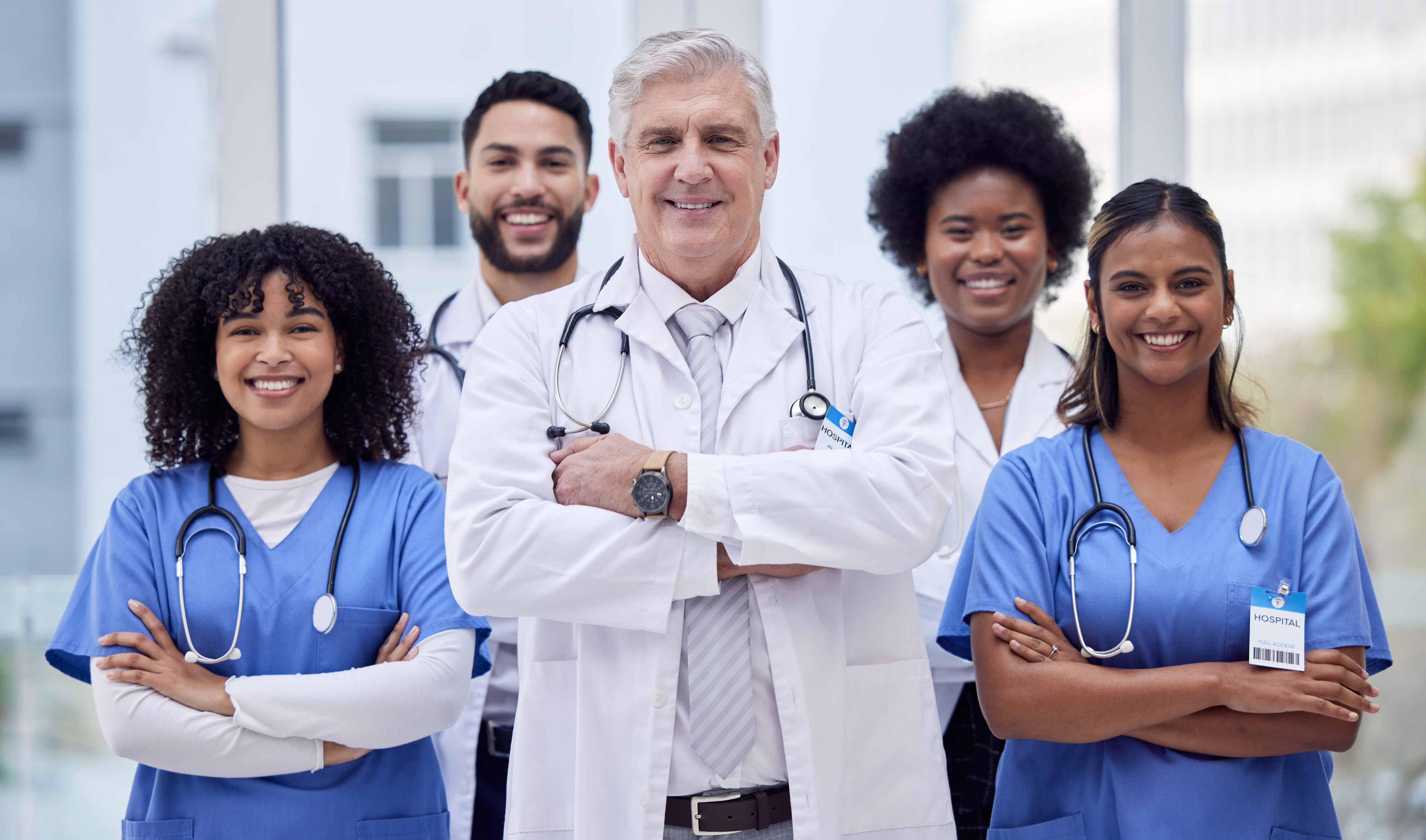 Group of healthcare professionals with arms crossed